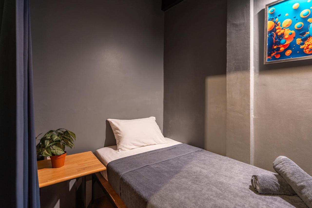 Private Single Bed with Shared Bathroom